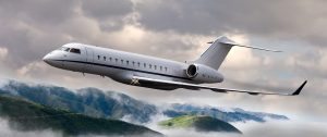 Private jet flying over mountains powerjet parts